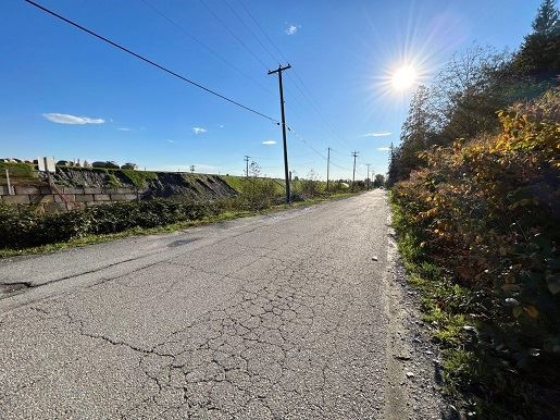 Sunlit paved road in Coquitlam