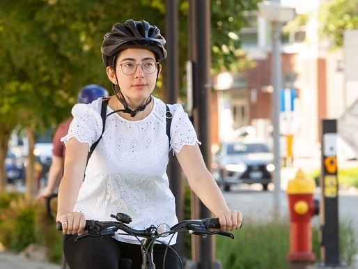 Person riding bike in urban area