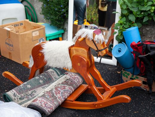 Rocking horse for sale along with other knick knacks.