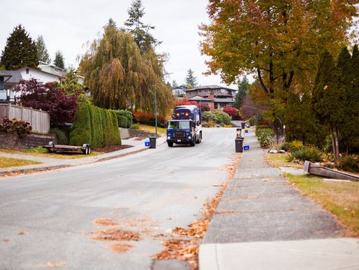 Curbside collection service taking place on a Coquitlam street