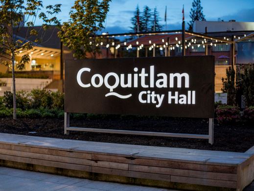 City Hall Coquitlam sign in at dusk