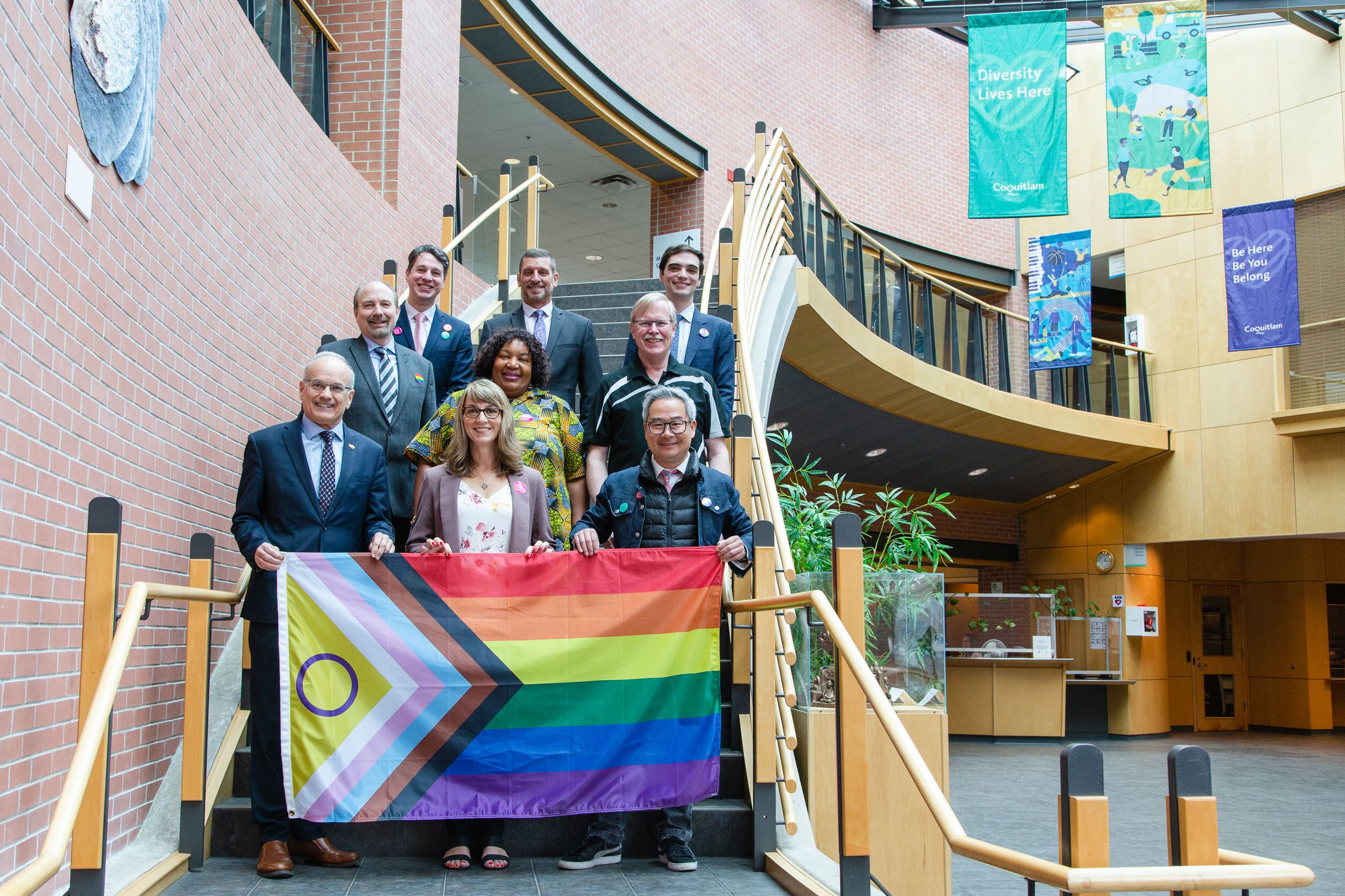 Coquitlam City Council holding the Pride flag