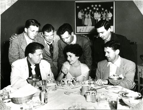 Fred Guiol attends a Hollywood function with Elizabeth Taylor, n.d.
