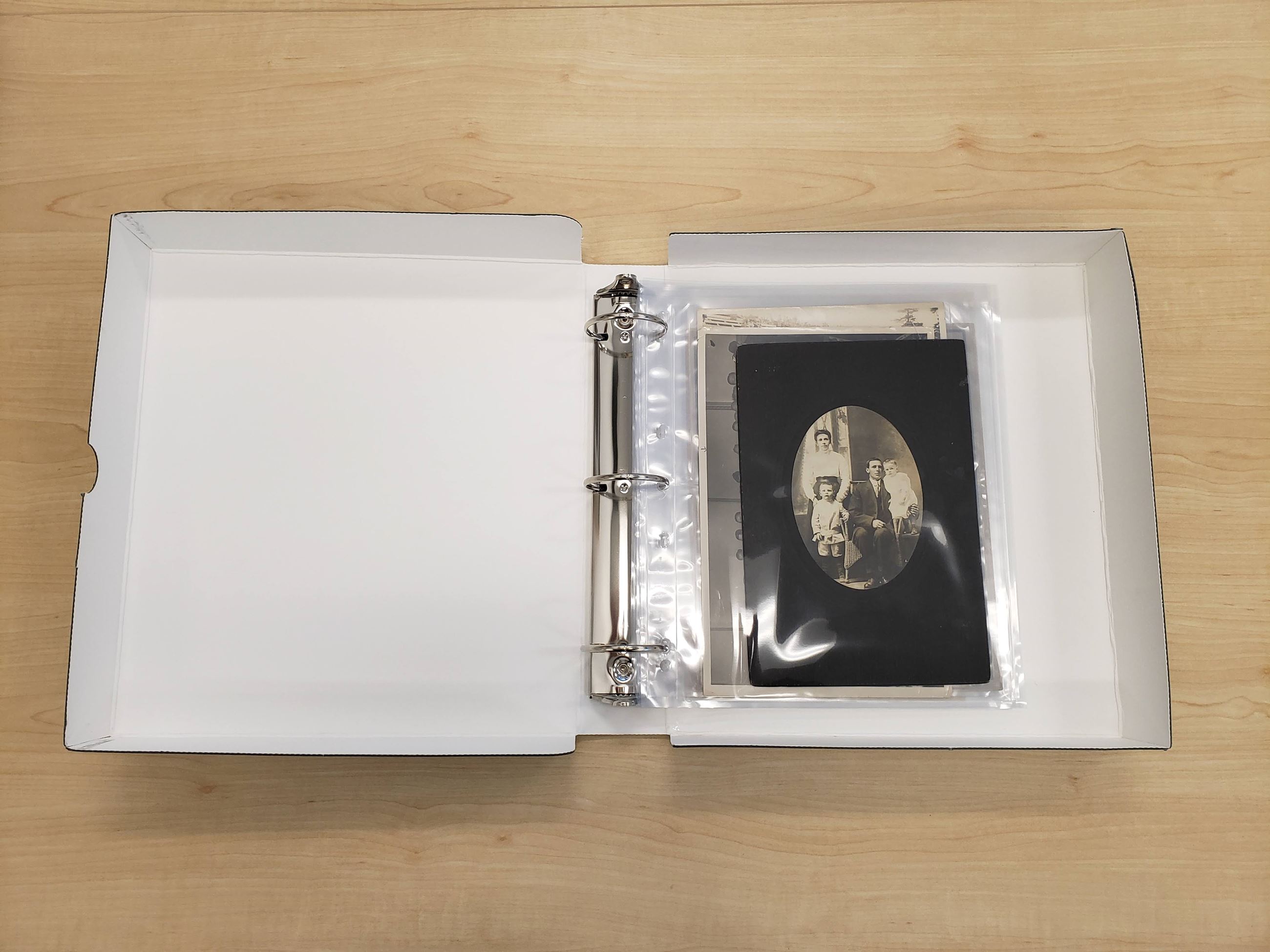 28 - Archival binder with plastic photo sleeves (Harris Family fonds, City of Coquitlam Archives)